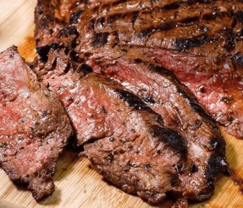 Shredded beef chuck roast piled on a plate.
